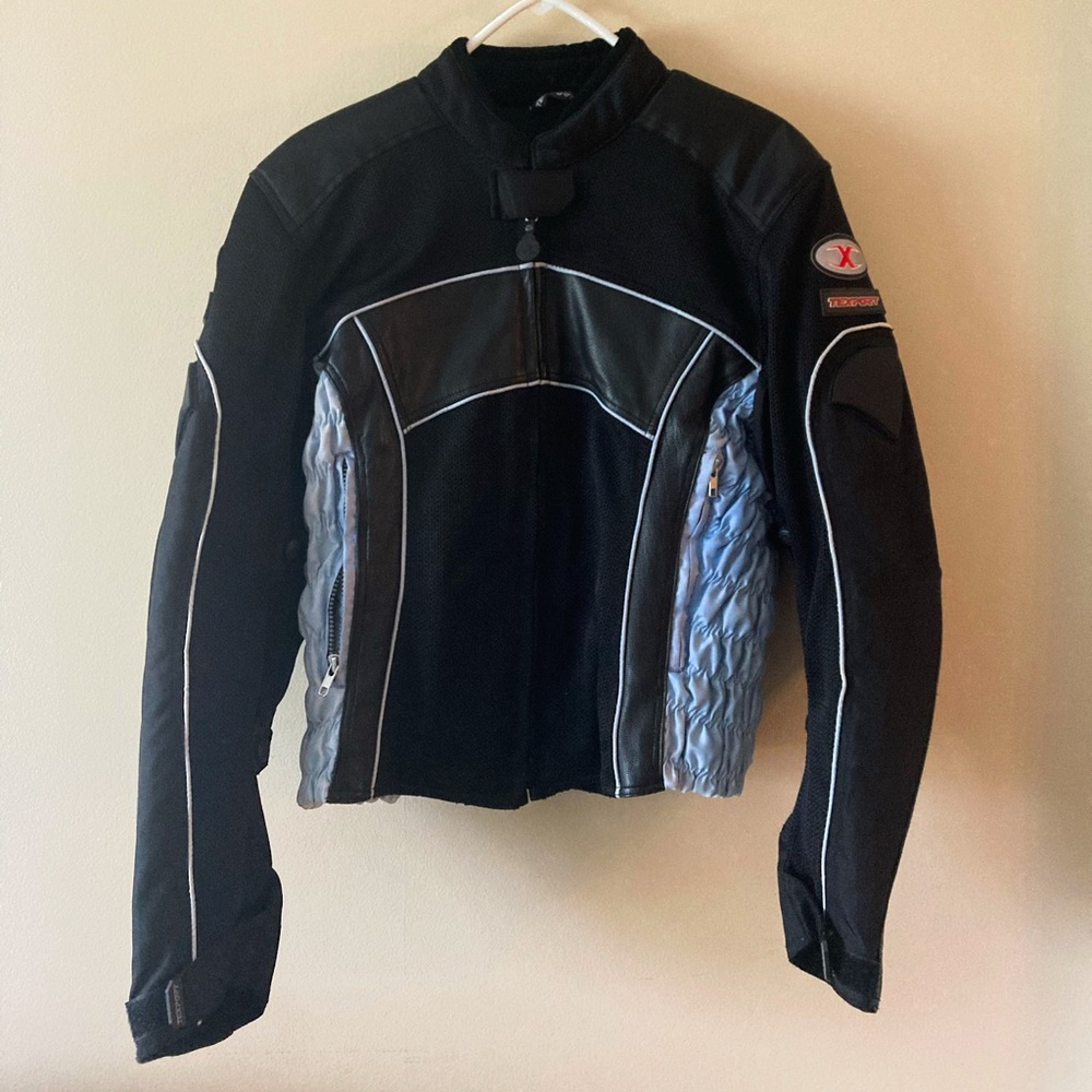 Woman’s riding jacket- like new condition.